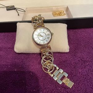 Gold tone watch by Akribos